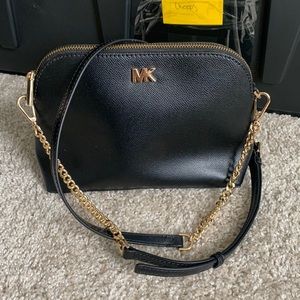 Black and gold Michael Kors purse